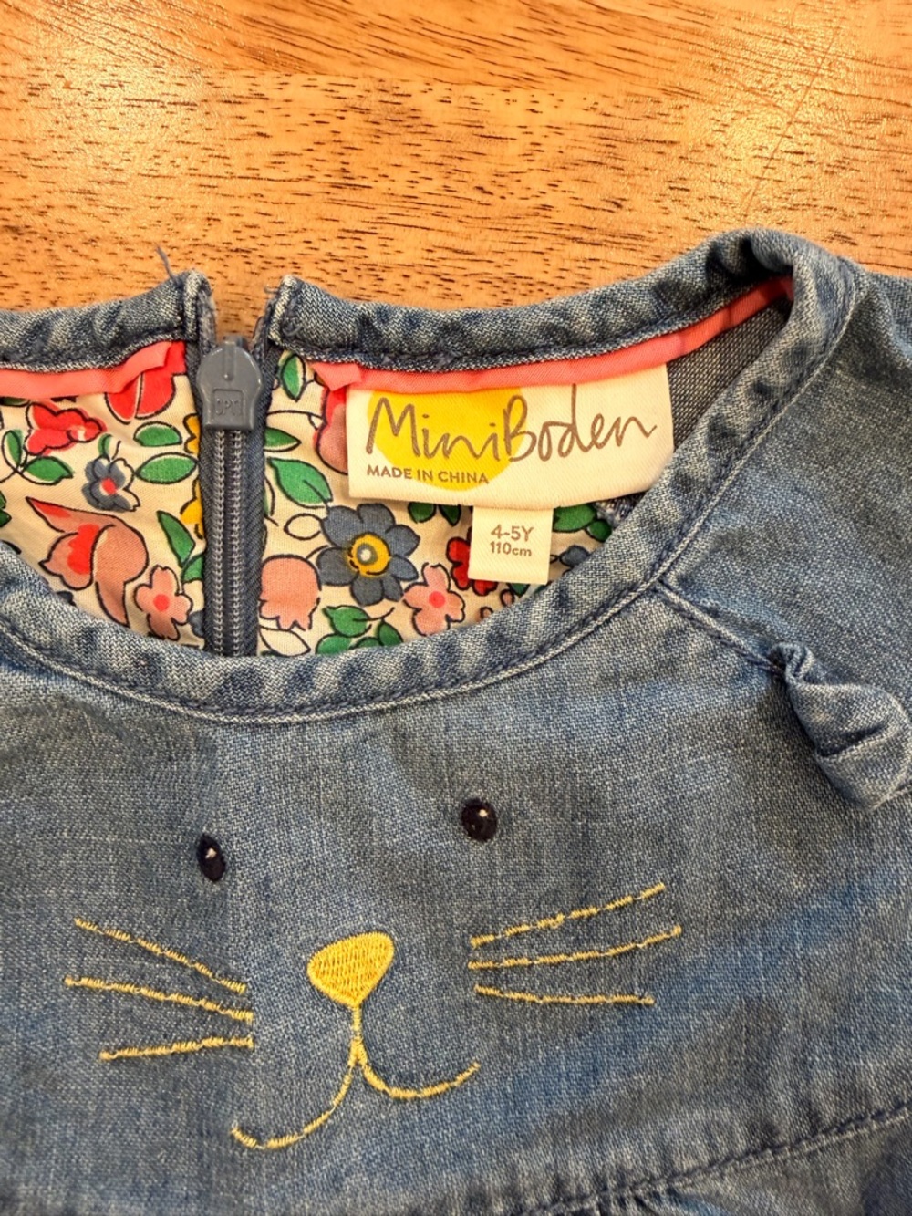 MiniBoden Denim Cat Face Dress - Blue with Yellow Embroidery 4-5Y